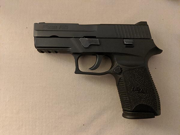 size of handguns: compact 9mm pistol