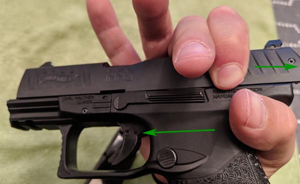 Step 3: Overhand grip on PPQ for disassembly
