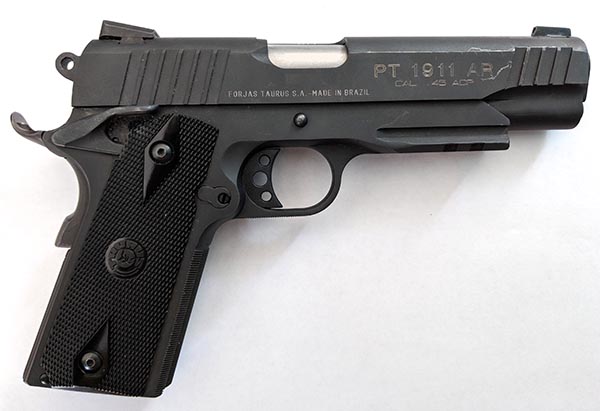 1911 model full size handgun chambered in 45 auto for concealed carry