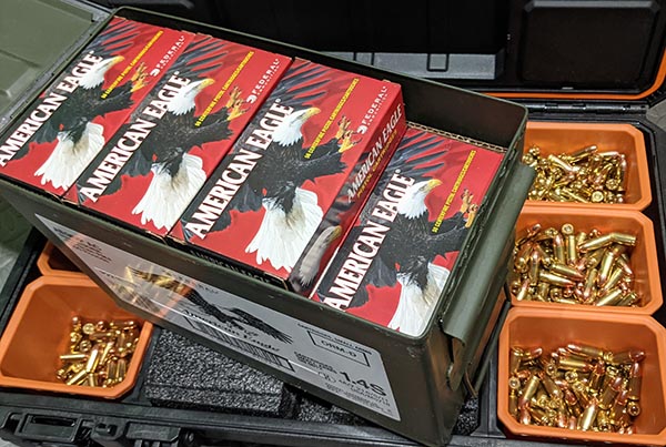 loose cartridges and boxed ammunition in ammo can